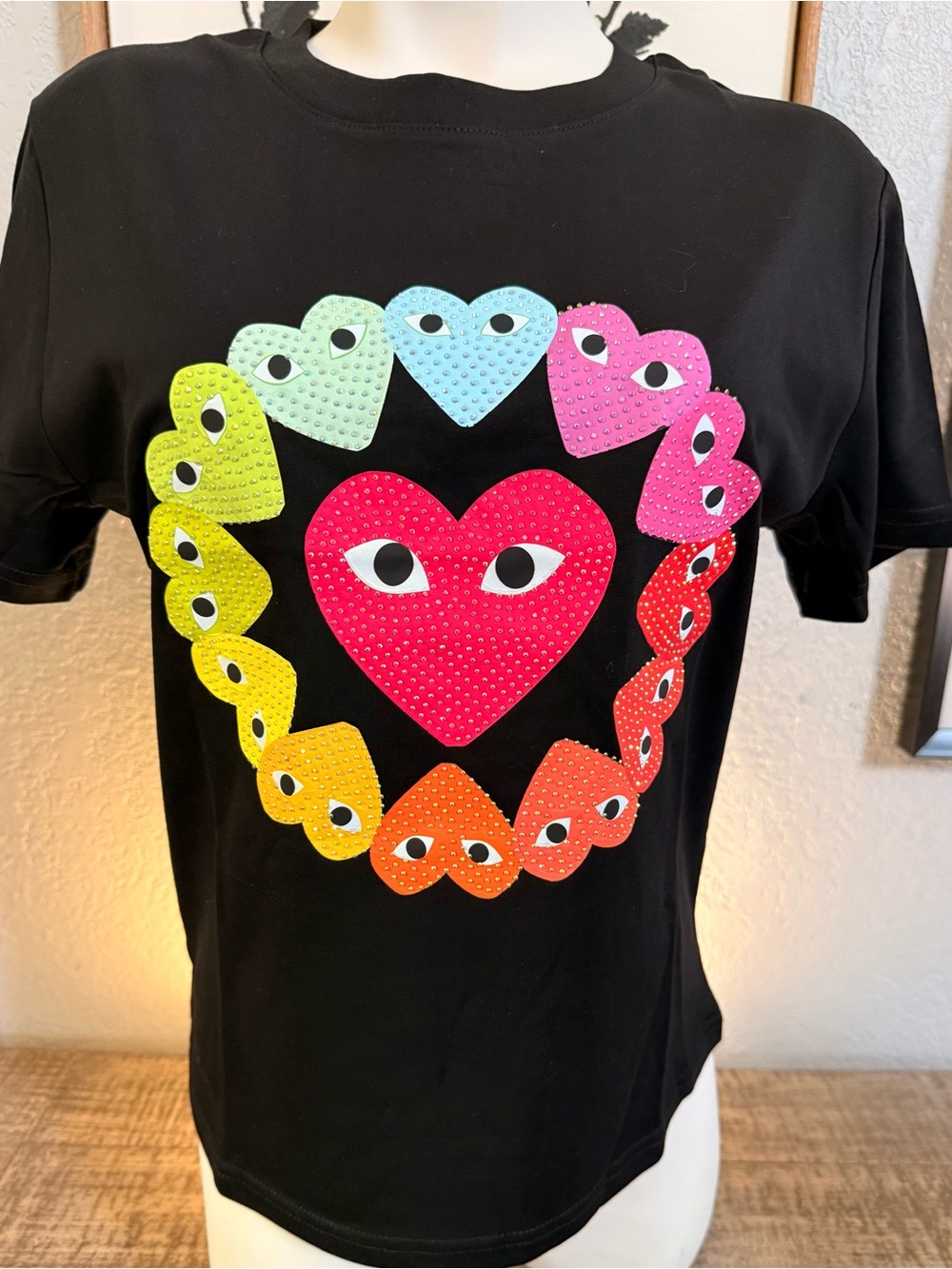 Women’s Black T-Shirt with Rainbow Heart Eyes Graphic